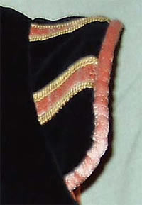 Braided trim on epaulet